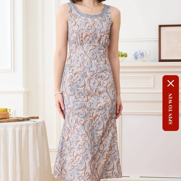 Elegant Blue and Brown Patterned Dress - Picture 5 of 6